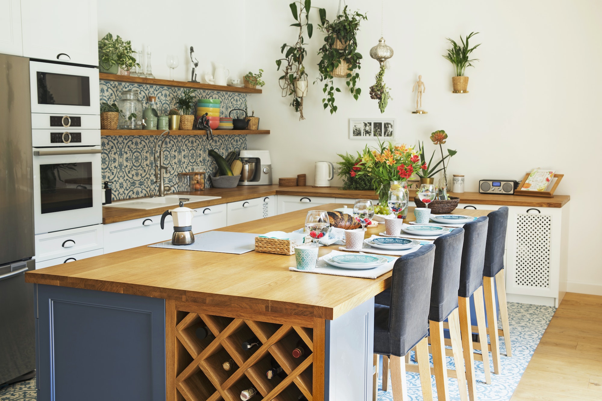 Stylish design of kitchen space interior with kitchen island.